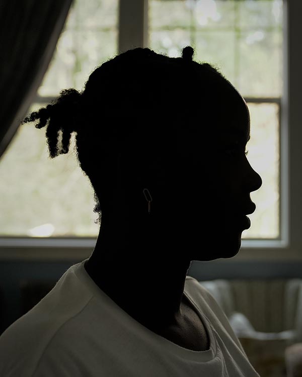 Silhouette portrait of a female asylum-seeker